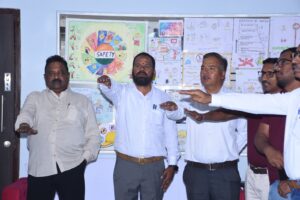 కార్మికుల భద్రతపై ప్రతిజ్ఞ చేస్తున్న అధికారులు, పరిశ్రమల ప్రతినిధులు